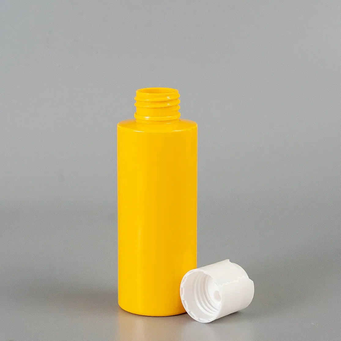 New Material Biodegradable Bottle Cosmetics PCR Recycled Pet Conatiner 60ml Disc Top Cap Bottle with Plastic Lid for Toner