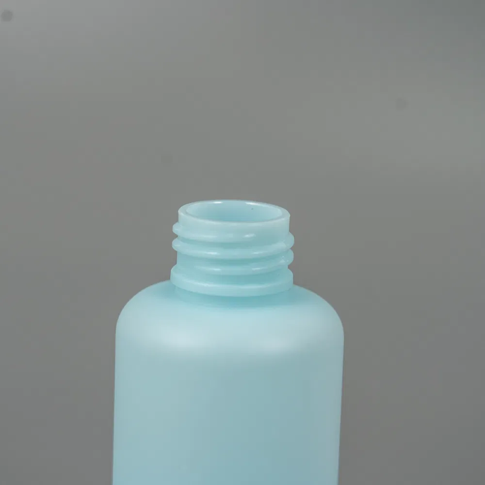 Classy Packaging Plastic Cosmetics Round Pet Bottle 50ml Cylinder Shape 1oz Soft Touch Effect Frosted Finish Black Treatment Pump Dispenser Bottle