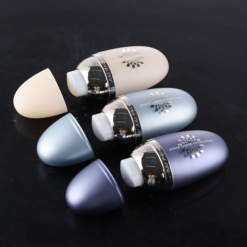 ISO 9001 Factory Customized Decoration Treatments Press Pump Facial Lotion Bottle Pebble Shape Plastic 30ml Makeup Foundation Bottle for Cosmetic Packaging