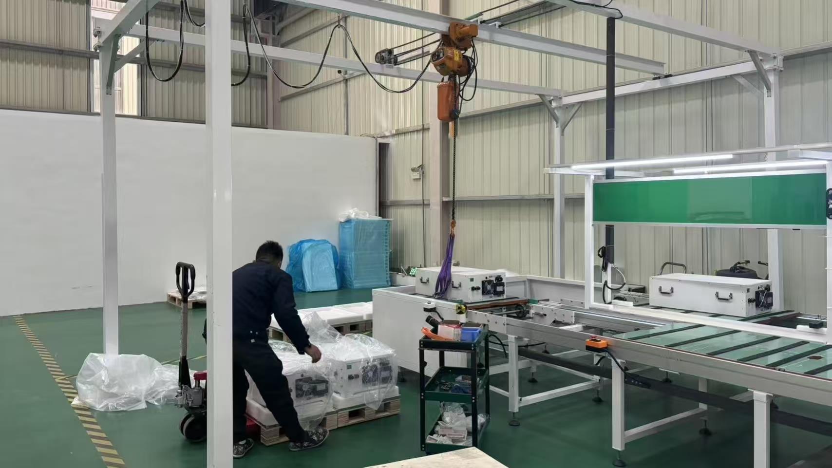 Battery assembly process at Vires Energy - skilled technicians assembling solar energy storage systems