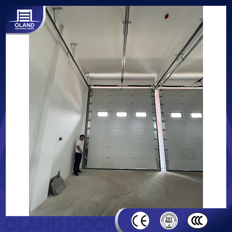 High Performance Wind Resistant Industrial Lift Overhead Sectional Sliding Door PU Foam Insulated Vertical High Lifting Gate for Factory Warehouse