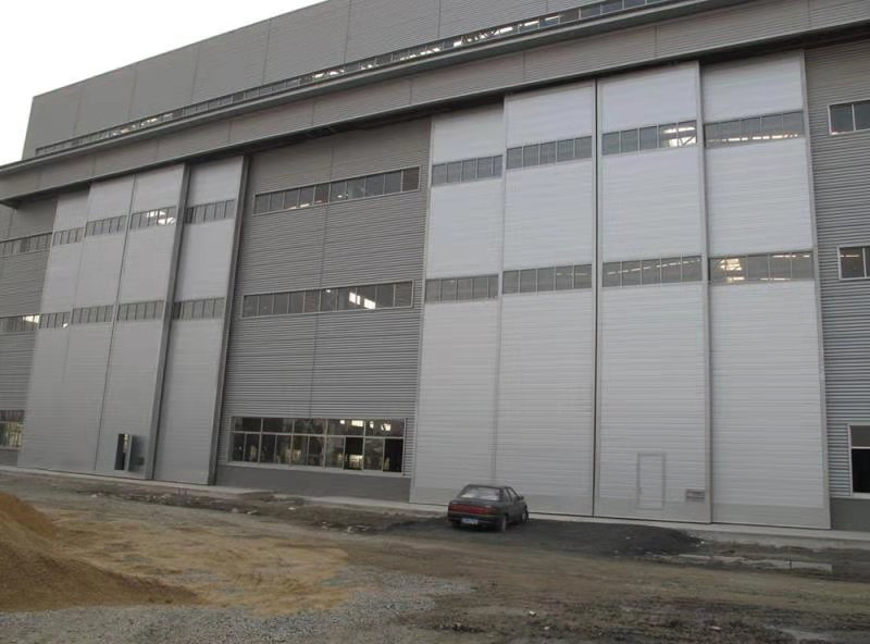 Exterior Vertical Lift Overhead Steel Sectional Industrial Door for Logistics or Warehouse