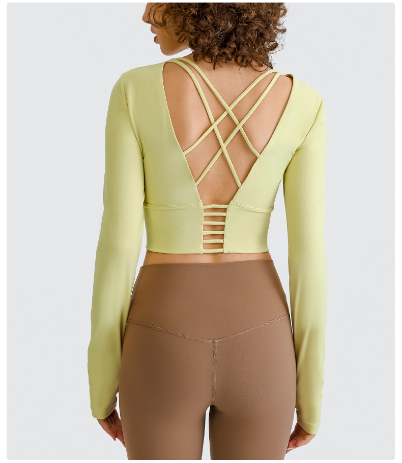 Wholesale Thumb Hole Cuffs Design Long Sleeve Back Cross Strap Women′ S Yoga Tops Fitness Activewear