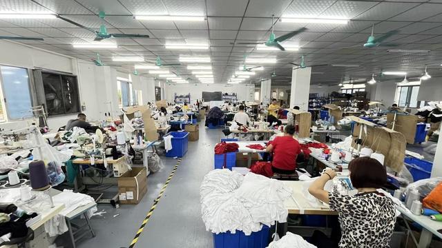 Wearth Apparel sportswear production floor with advanced manufacturing equipment