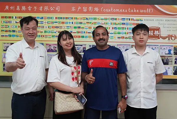 Overseas buyers inspecting smart TV assembly lines