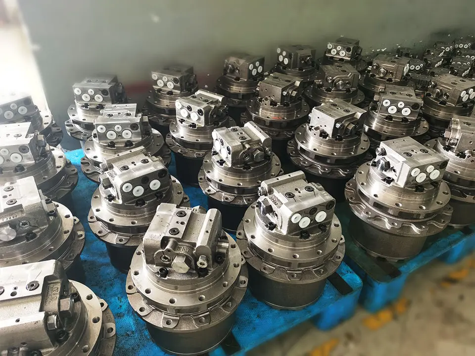 Unpainted Final Drives - pre-finishing hydraulic motors ready for QC