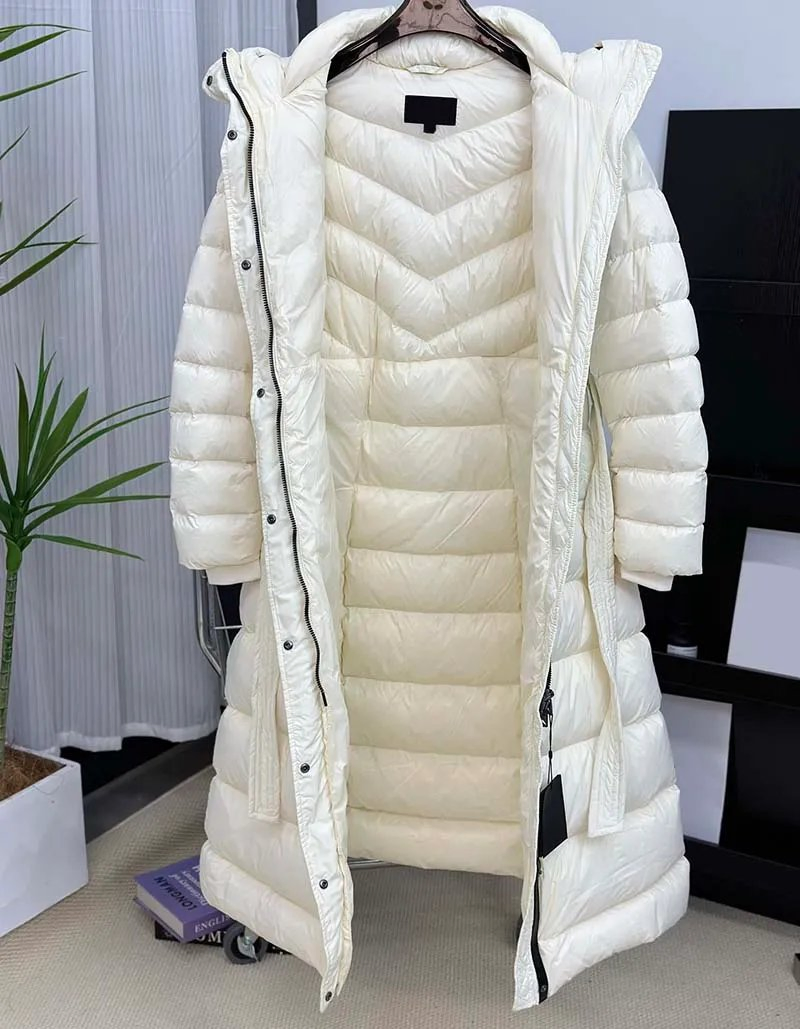 Outdoor Fashion Women Long Down Jacket Waist Tie Puffer Jacket Winter Hooded Warm Coat Xs-XL Clothes