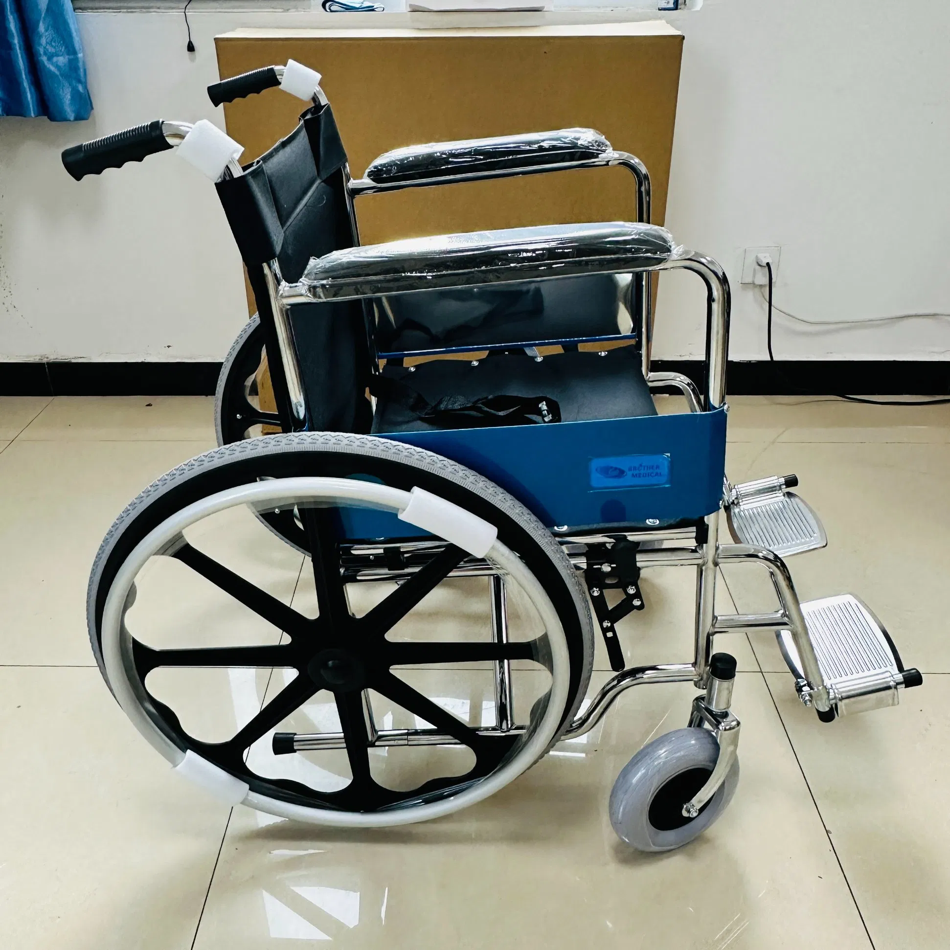 Manufacturer Wholesale Manual Elderly Disabled People Folding Steel Wheelchair with Mag Wheel