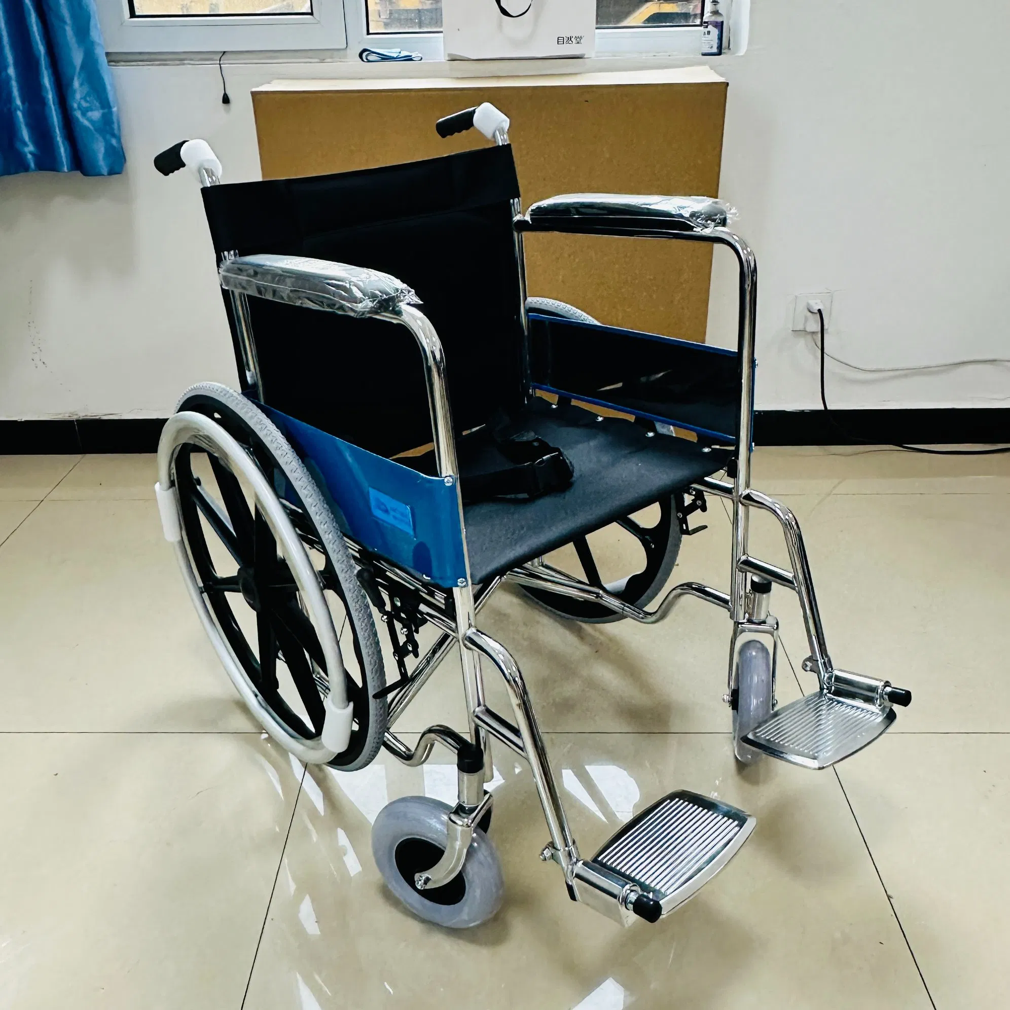 Manufacturer Wholesale Manual Elderly Disabled People Folding Steel Wheelchair with Mag Wheel
