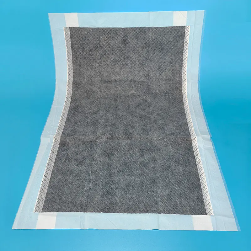 Custom CCUPB1 Training Pads with Four Corner Positioning Spunbond Top Layer Carbon Paper PE Back Sheet Manufacturer, Factory