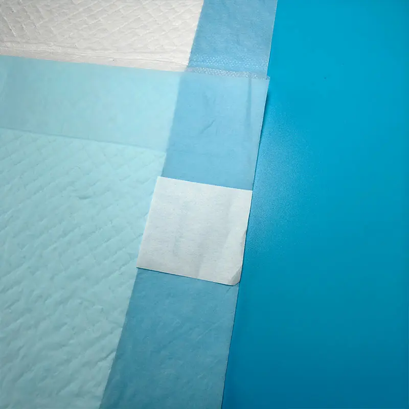 OEM CCNPP1 Disposable Bed Pads with Spunbond Nonwovens Top Sheet Four-corner Positioning Manufacturers, Factories