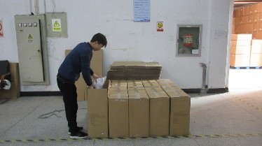 Final packaging and labeling process for export-ready pet furniture products