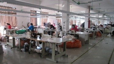 Wilsons Pets quality sewing process — skilled workers ensuring precision stitching for pet furniture