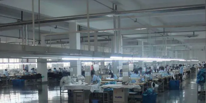Quality inspection and finishing area at Zhongda Wincome garment factory