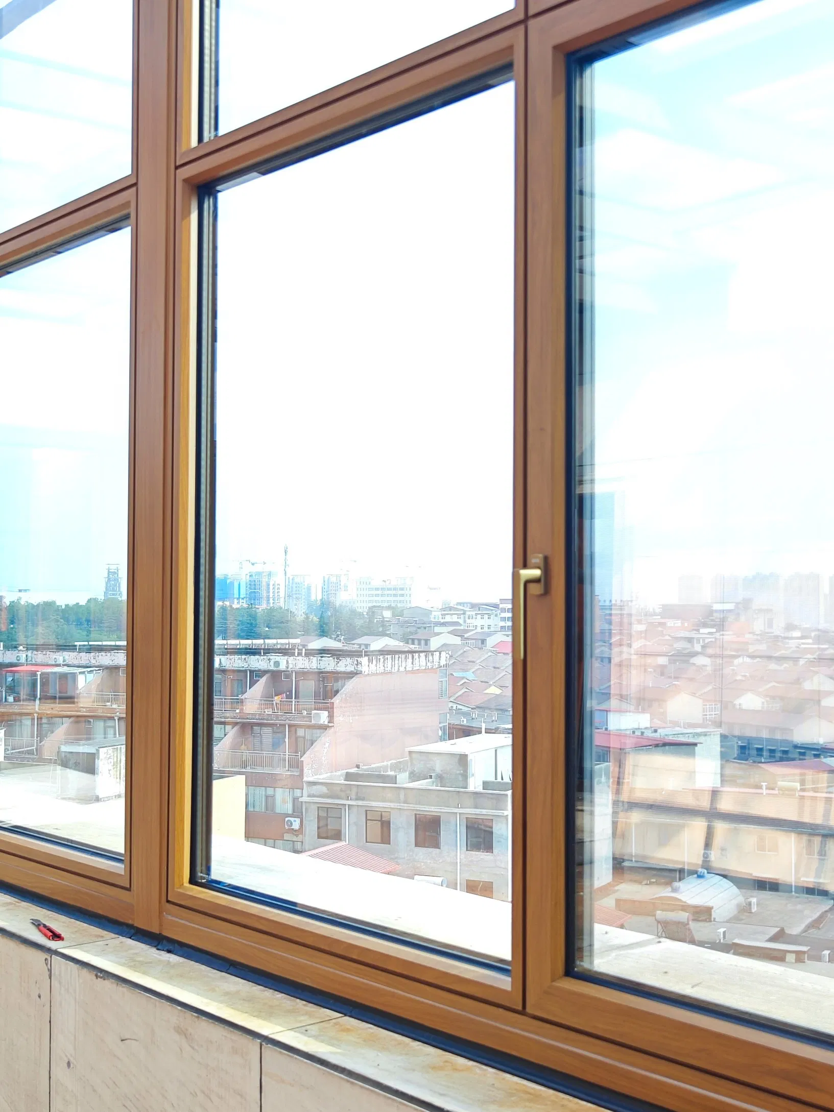 Hurricane-Impact Resistant Aluminum Clad Wood Windows and Doors System