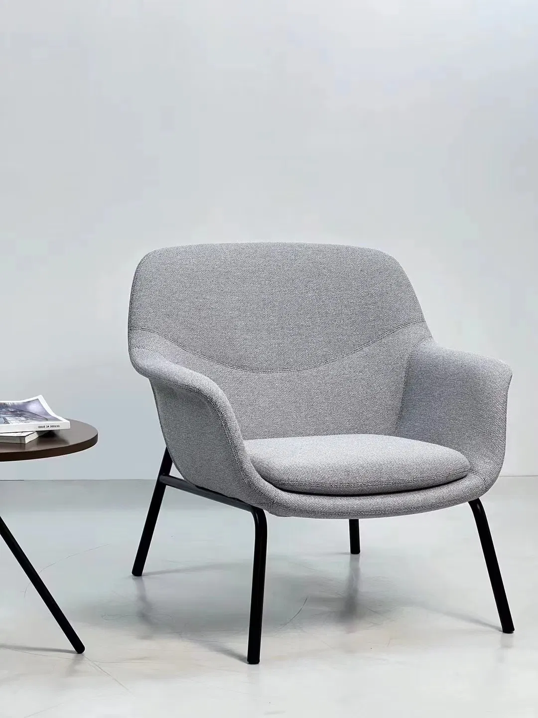 Ergonomic Design Chair with a Middle Height Backrest for Support