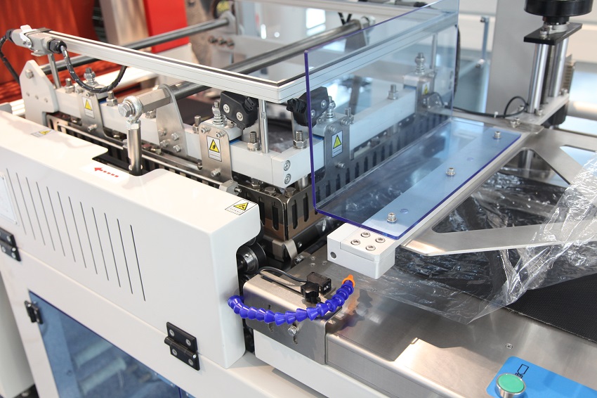 BSF-5640LG Hualian Automatic Packaging Box Wrap PVC Film Packing L Bar Sealer Side Sealing Heat Shrink Wrap Wrapping Machine