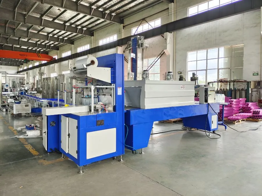 Automatic PE Film Heat Shrink Tunnel Packing Machine Sleeve Wrapping Packaging Machine Price