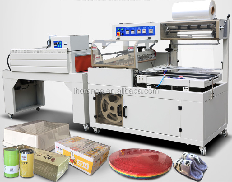 Shrink wrapping machine