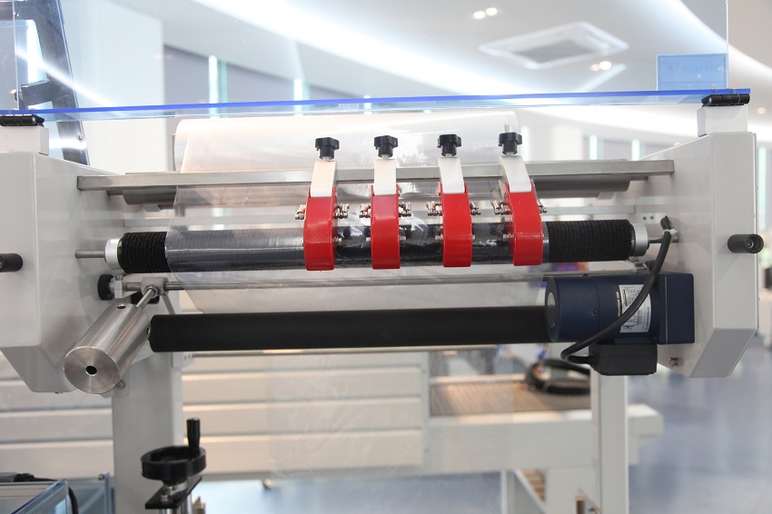 BSF-5640LG Hualian Automatic Packaging Box Wrap PVC Film Packing L Bar Sealer Side Sealing Heat Shrink Wrap Wrapping Machine