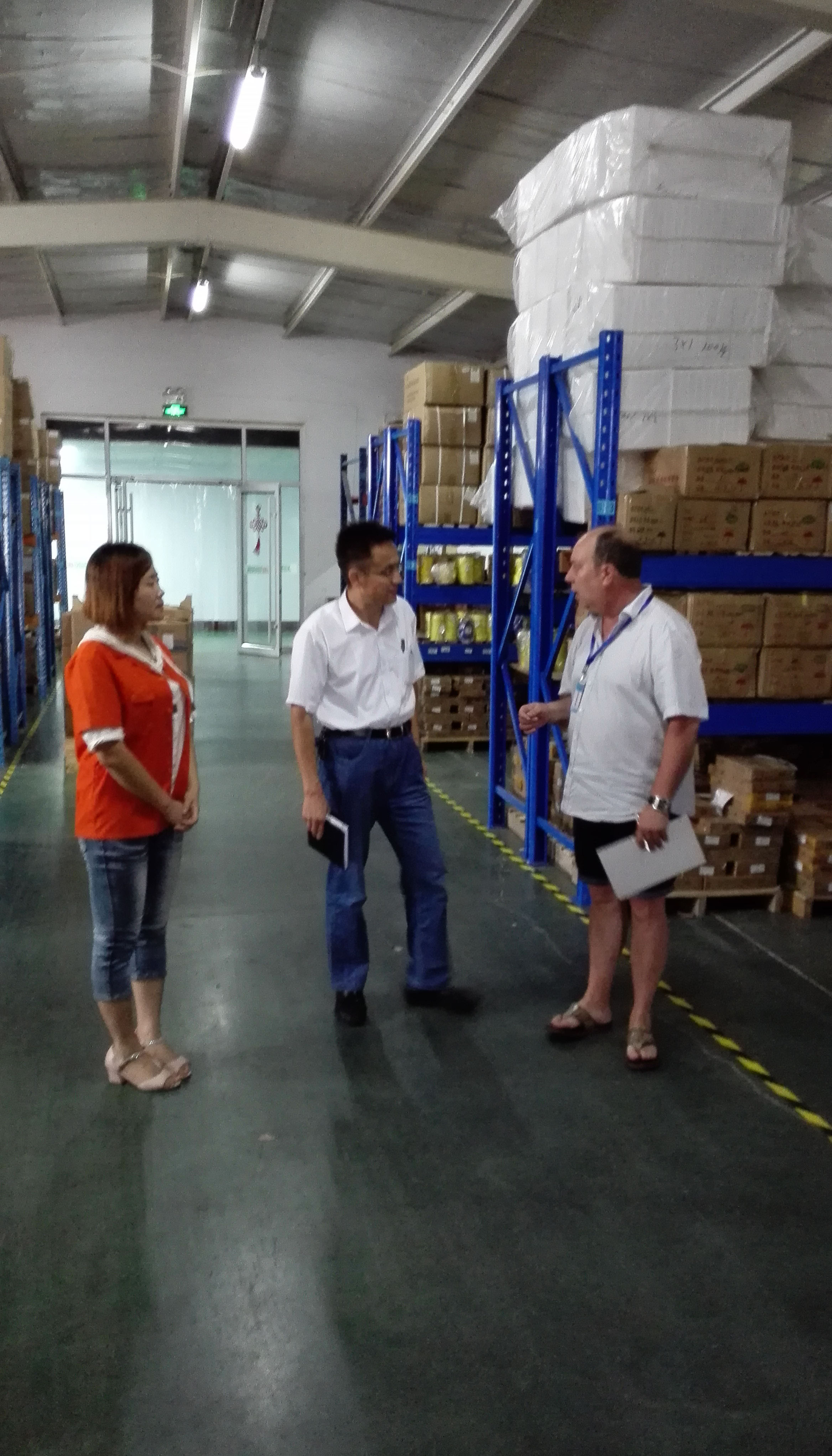 Customer delegation touring Xinping Electric manufacturing facility