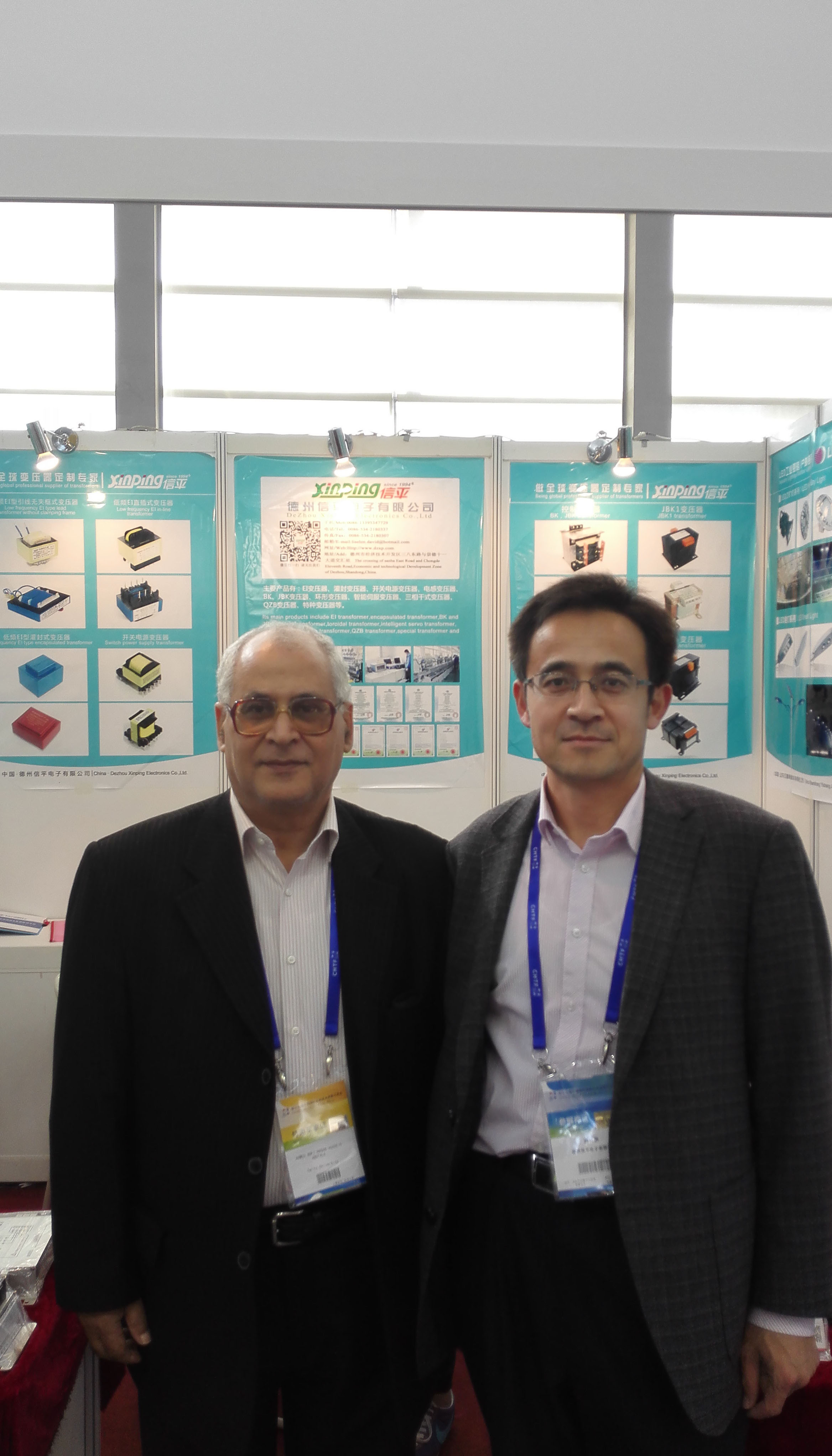 Global procurement team reviewing transformer quality at Xinping Electric