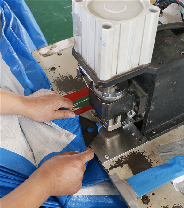 Step 7 triangular corner reinforcement of tarpaulin cover