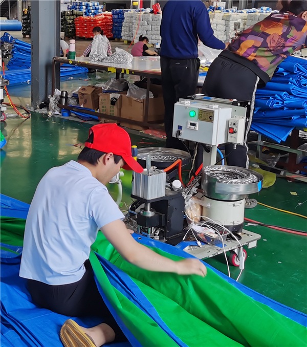 Step 6 eyelet drilling and punching on tarpaulin sheets