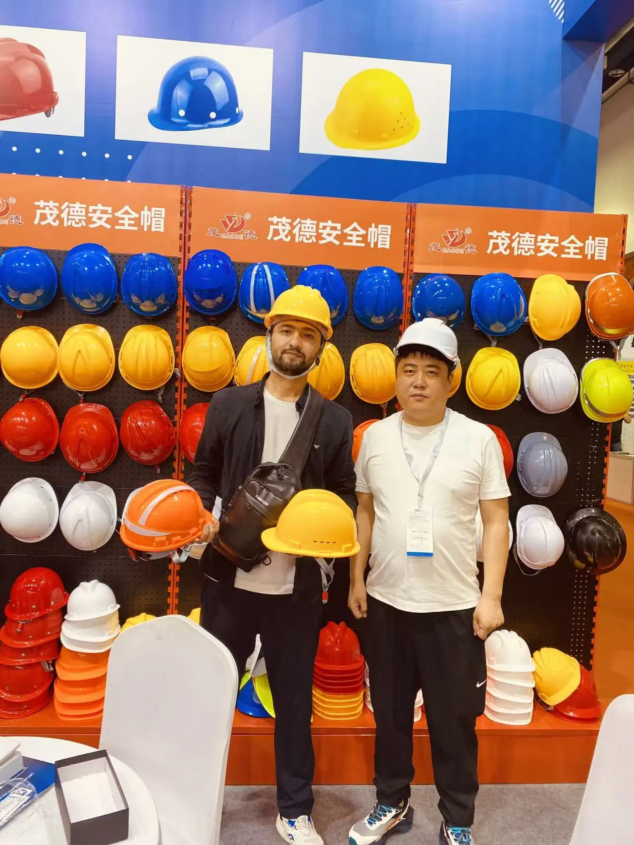 Xintuo global exhibition - demonstrating safety helmet product range