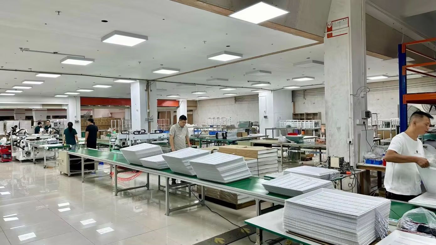 Xolle Light LED lights assembling station on factory floor