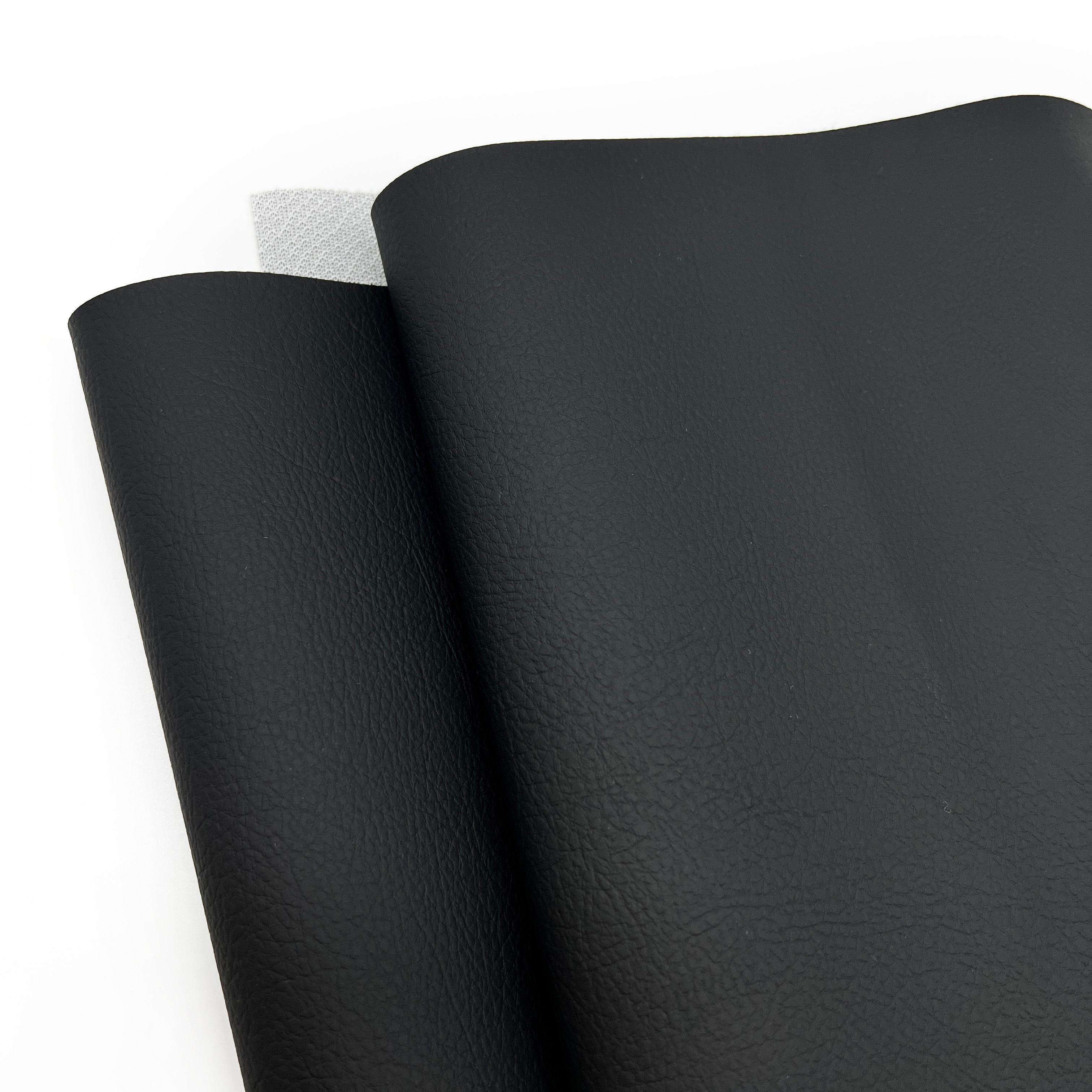Hot Sales 1.1mm Black PVC Synthetic Leather Fabric Embossed Car Seat Covers for Cars for Furniture Decorative Bags and Sofas