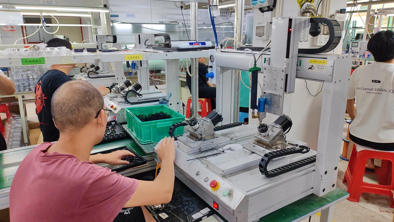 Automatic dispensing machine for motor adhesive application