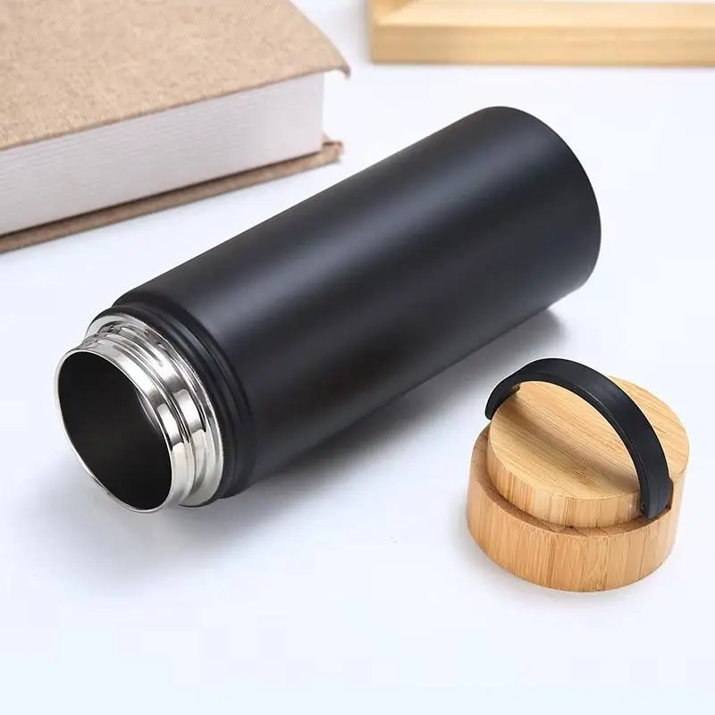 China Resuable 500ml Double Wall Stainless Steel Water Bottle with Bamboo Lid Vacuum Insulated Travel Thermos with Handle Suppliers, Factory