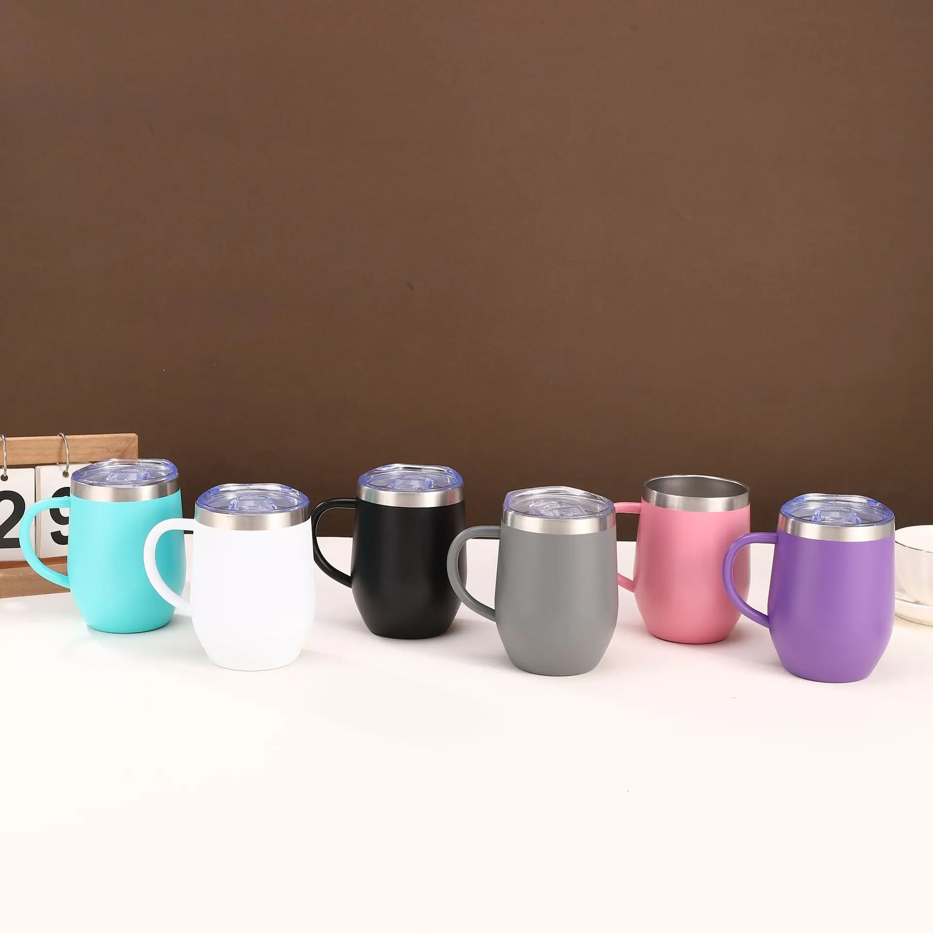 Wholesale 12oz Egg Shape Stainless Steel Vacuum Insulated Coffee Tumbler with Handle Supplier, Suppliers