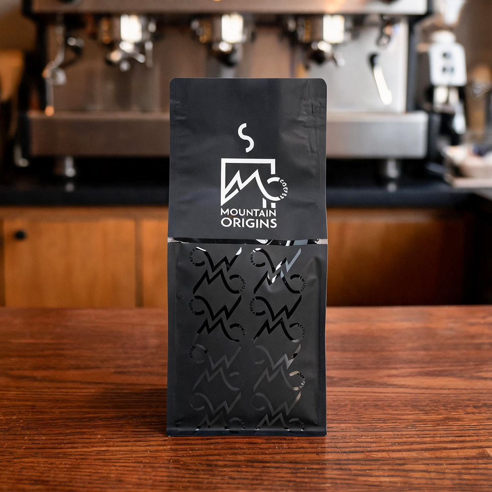 Custom Custom Flat Bottom Coffee Bags with Valve | Embossed Logo & Spot Matte Finish Manufacturers, Suppliers