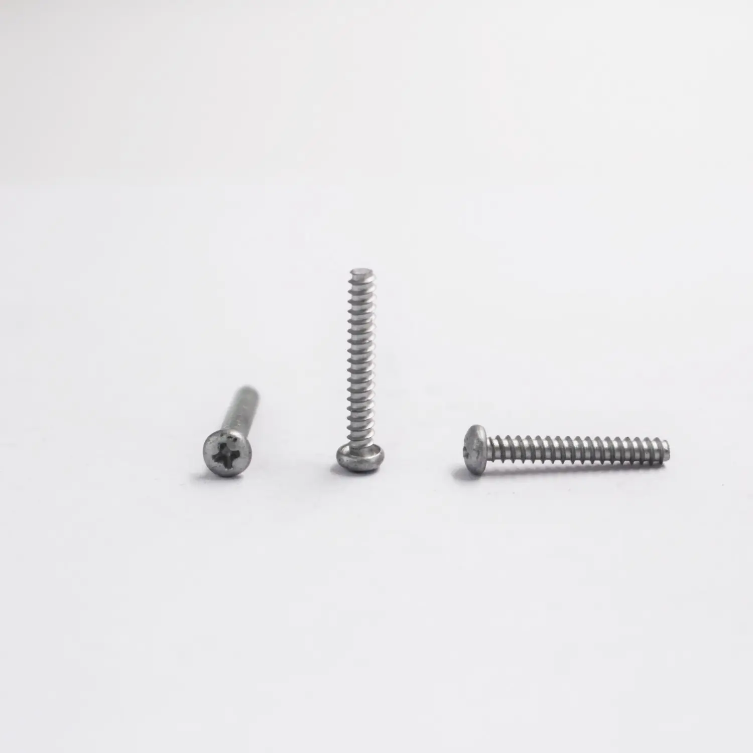 Phillips pan head self tapping screw for plastic and sheet metal assembly