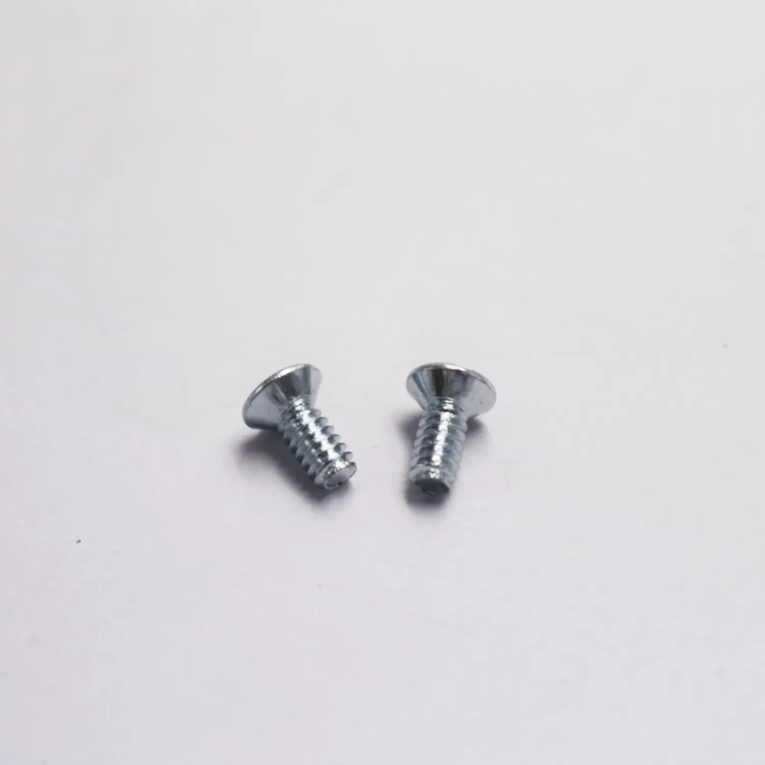 China Countersunk Head Slotted Zinc Plated Machine Screw for Flush Panel Installation Manufacturers, Factories