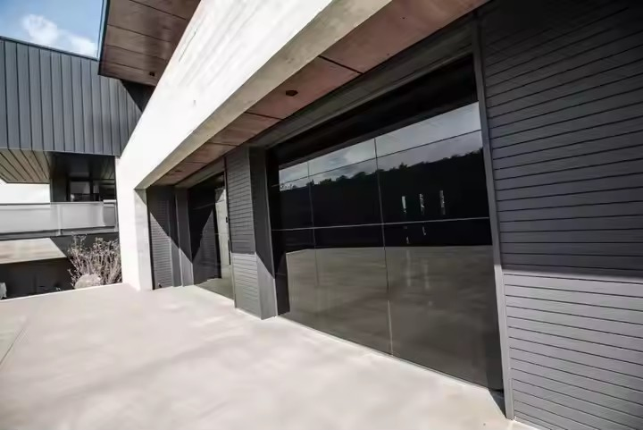 Guangdong Modern Black Frameless Flush Aluminum Security Garage Door with Mirror Glass View