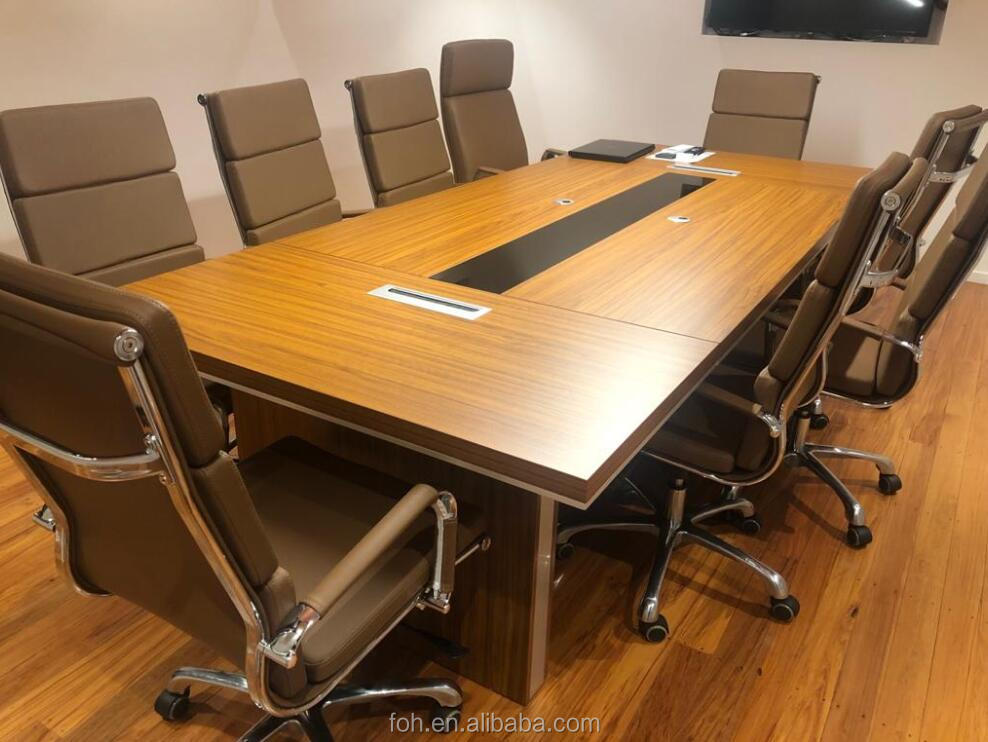 Installed pure white glossy meeting table setup