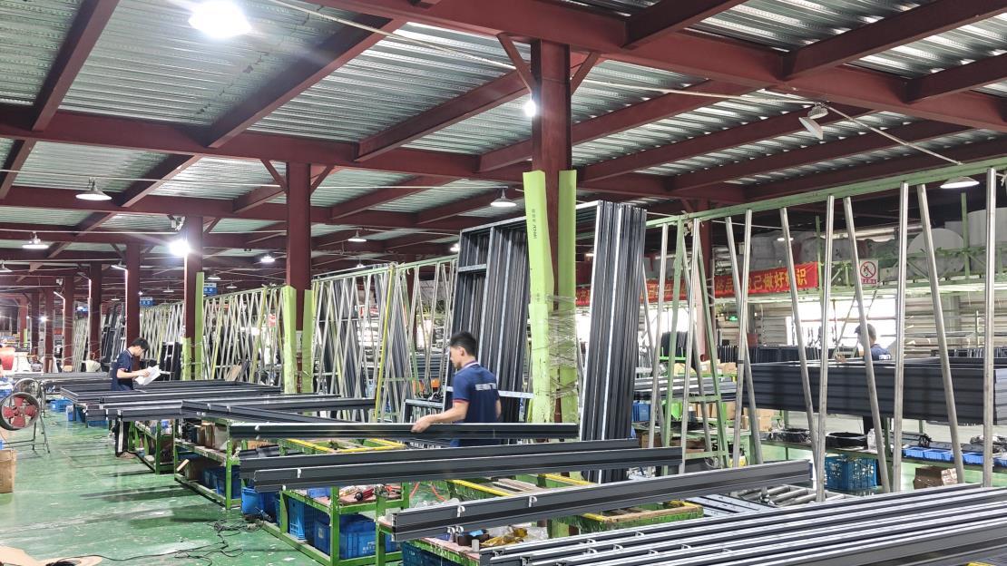 Frame Corner Crimping and Structural Assembly Line 1