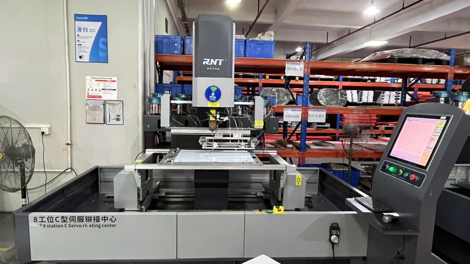 Automated riveting center for high-volume production