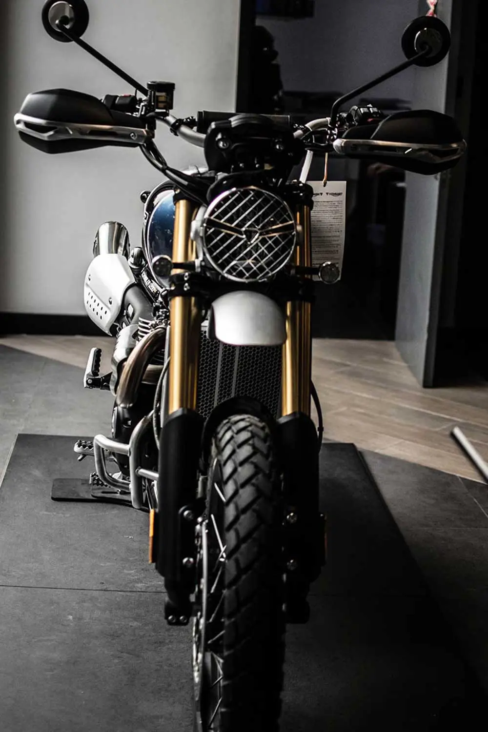 Tie-down straps securing electric motorcycle for transport