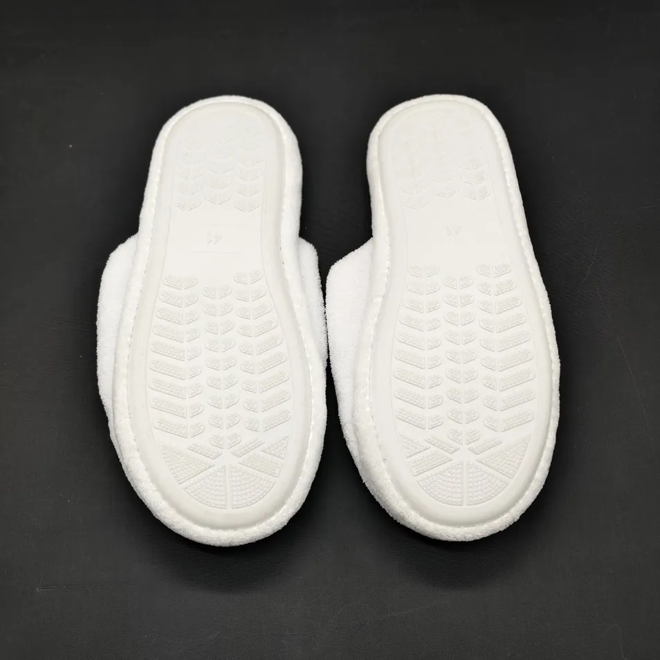Zapatillas de hotel premium con suela de TPR y acolchado interior de algodón natural