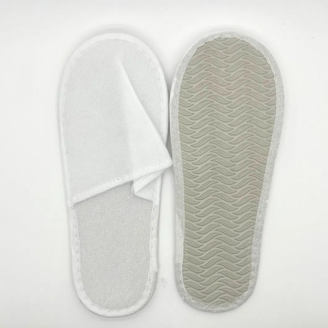 Zapatillas de hotel cómodas con marca personalizada para estancias de lujo