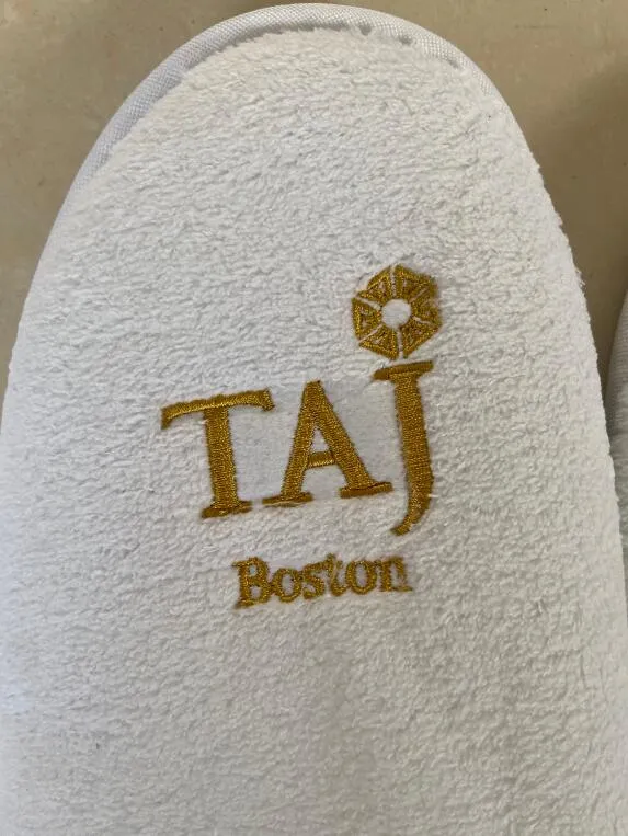 Zapatillas desechables personalizadas blancas para hoteles al por mayor