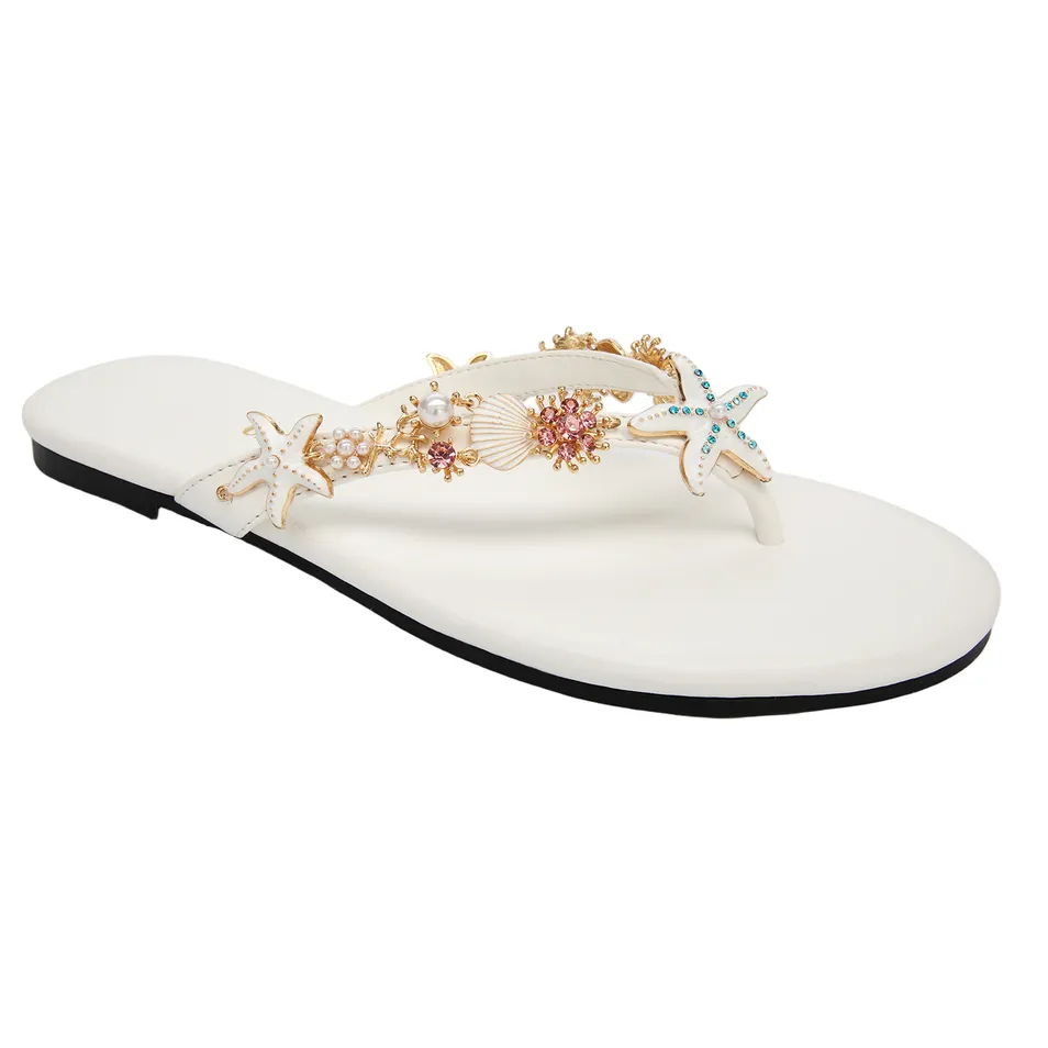 Chanclas de mujer con detalles de estrella de mar, conchas y rhinestones
