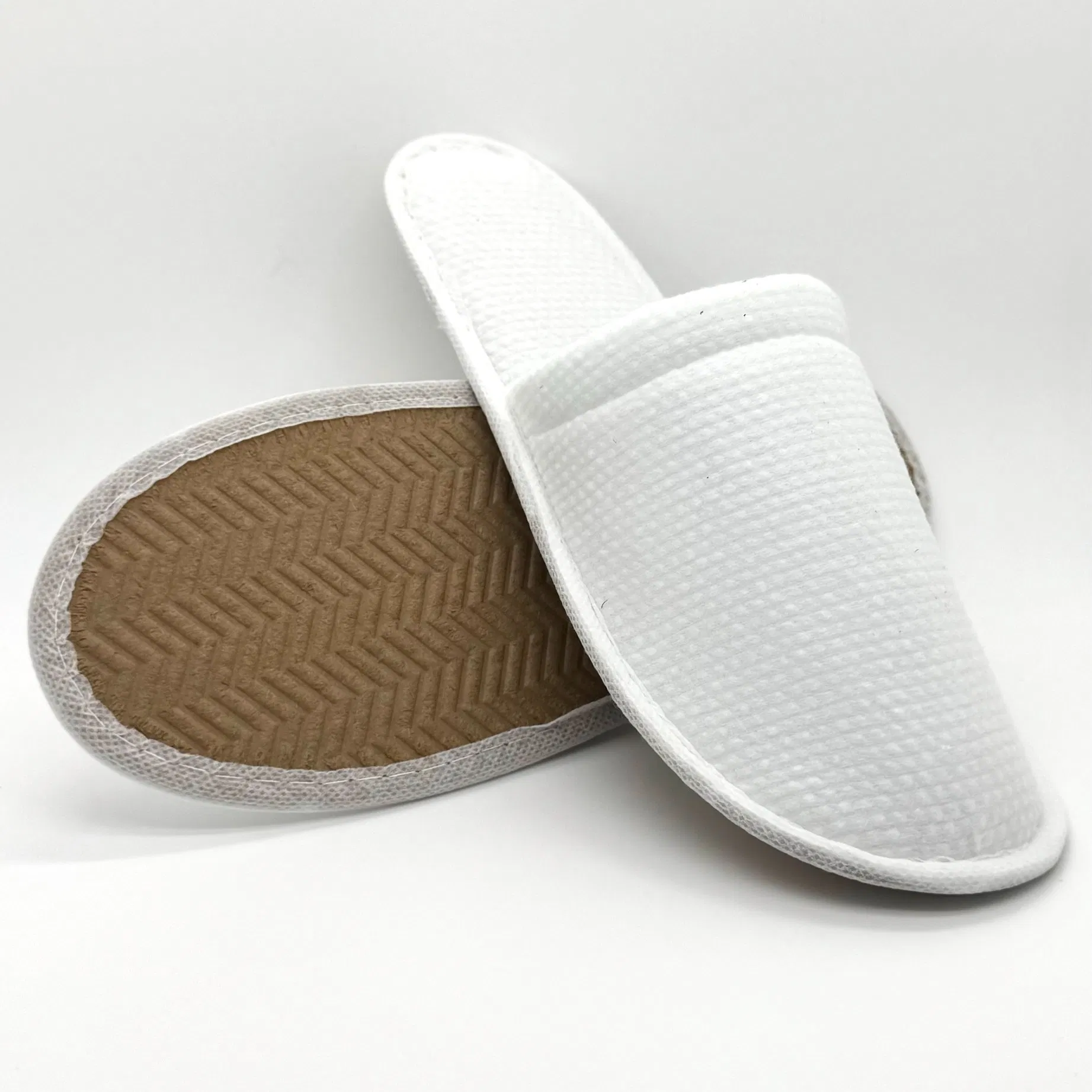 Zapatillas desechables de hotel premium con diseño de logo personalizado