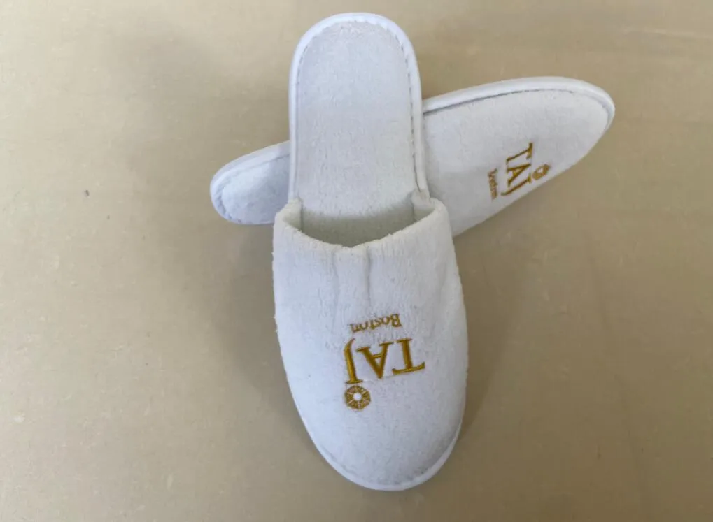 Zapatillas desechables personalizadas blancas para hoteles al por mayor