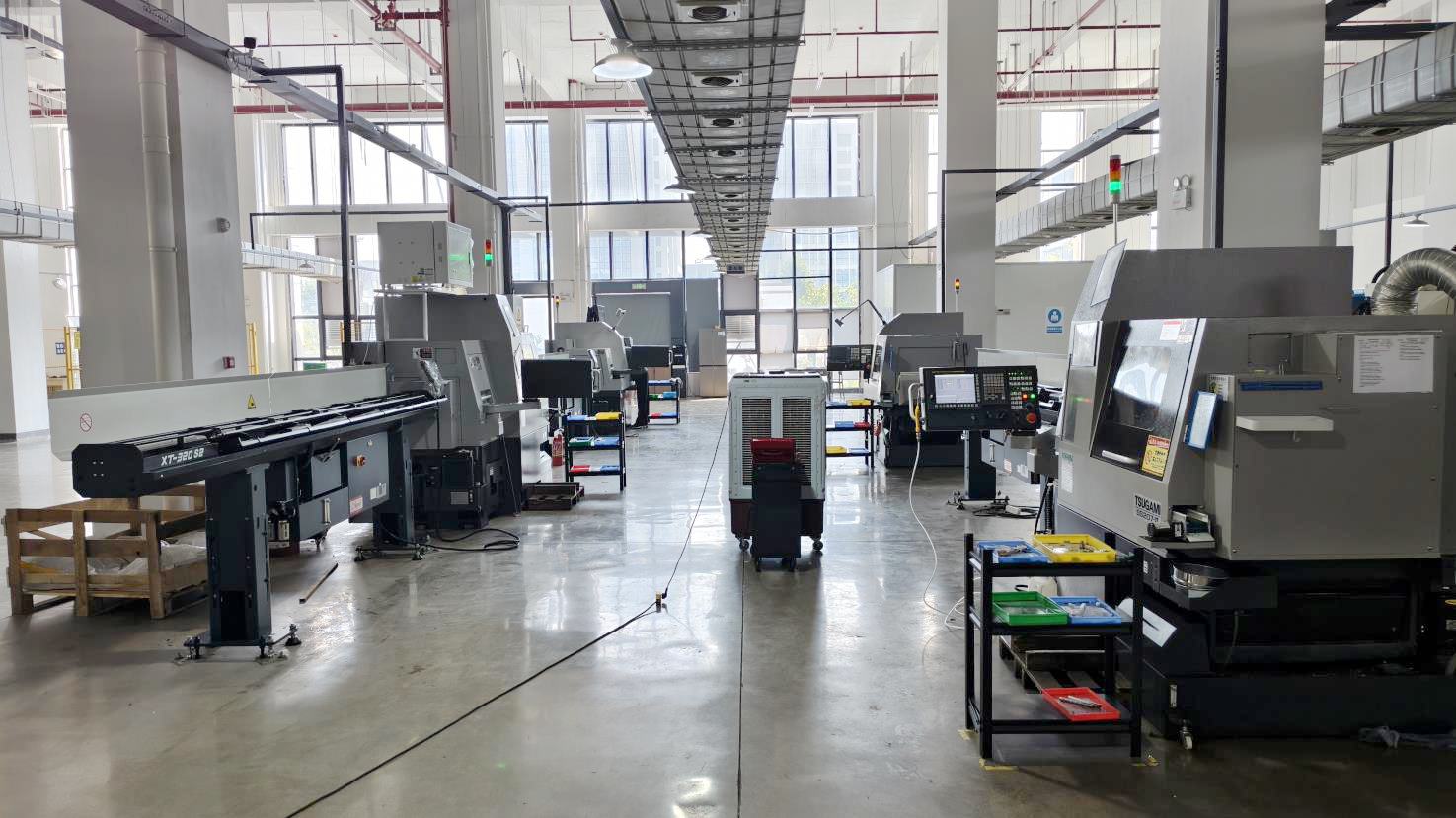 Swiss-type lathe for high-precision small orthopedic implant component production